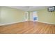 Comfortable bedroom with vinyl floors, neutral paint, a ceiling fan, and easy access at 107 Minus St, Saint George, SC 29477