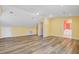 Spacious bonus room featuring wood floors and an abundance of natural light at 107 Minus St, Saint George, SC 29477