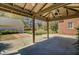 Covered patio provides outdoor space overlooking the expansive backyard at 107 Minus St, Saint George, SC 29477