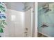 Bathroom featuring a shower-tub combination and a walk-in closet with storage solutions at 108 Chemistry Cir, Ladson, SC 29456