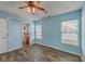 This bright bedroom features wood flooring and large windows for natural light at 108 Chemistry Cir, Ladson, SC 29456