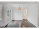Cozy dining room featuring sleek floors and modern light fixture at 1146 Rivercrest Dr, Charleston, SC 29412