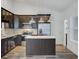 Well-designed kitchen with stainless steel appliances, island, and updated cabinetry at 1146 Rivercrest Dr, Charleston, SC 29412