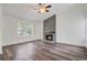 Bright living room with modern fireplace, recessed lighting and sleek, wood-look floors at 1146 Rivercrest Dr, Charleston, SC 29412