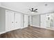 Bedroom with an attractive ceiling fan and lots of closet space at 1174 Fort Johnson Rd, James Island, SC 29412