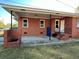 Brick home with a covered parking area, nice exterior paint and brickwork at 1236 Fort Dr, Hanahan, SC 29410