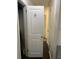Hallway with a door open featuring coat hooks, leading into a brighter room at 1236 Fort Dr, Hanahan, SC 29410