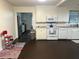 Spacious kitchen with white appliances, tiled backsplash, and ample counter space for cooking at 1236 Fort Dr, Hanahan, SC 29410