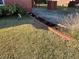 Well-defined flower beds and decorative accents enhance this homes curb appeal at 1236 Fort Dr, Hanahan, SC 29410