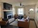Inviting living room with a stylish fireplace, comfortable seating, and bright natural light at 1236 Fort Dr, Hanahan, SC 29410