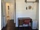 Home office with hardwood floors, natural light, and a storage rack with office supplies at 1236 Fort Dr, Hanahan, SC 29410