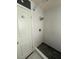 Modern tiled shower with pebble floor and bronze fixtures at 1236 Fort Dr, Hanahan, SC 29410