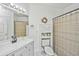 Bright bathroom features a vanity, mirror, toilet, and shower/tub combo at 1325 Telfair Way, Charleston, SC 29412