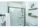 Modern bathroom features glass enclosed shower with white subway tiles at 1325 Telfair Way, Charleston, SC 29412