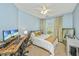 Bedroom with desk and chair, ceiling fan, and natural light from large window at 1325 Telfair Way, Charleston, SC 29412