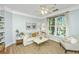 Inviting living room filled with light, featuring stylish furniture, neutral tones, and an airy atmosphere for relaxed living at 1325 Telfair Way, Charleston, SC 29412