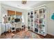 Home office features a large white bookcase and a bright window at 1515 Devons St, Charleston, SC 29412