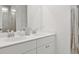 Bright bathroom featuring double sinks and white cabinetry at 1827 Nola Run, Summerville, SC 29485