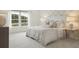 Beautiful bedroom with large window, patterned wallpaper, and light-colored linens at 1827 Nola Run, Summerville, SC 29485