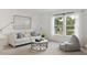 Cozy sitting area with comfortable sofa, bean bag chair and natural lighting at 1827 Nola Run, Summerville, SC 29485