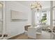 Bright and modern office space with shiplap walls, a stylish light fixture, and French doors at 1827 Nola Run, Summerville, SC 29485