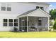 Charming screened porch with outdoor seating, perfect for enjoying the fresh air at 1827 Nola Run, Summerville, SC 29485