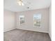 Bedroom with plush carpeting and large windows offering plenty of natural light at 184 Charlesfort Way, Moncks Corner, SC 29461