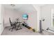 Bedroom with a workstation, television and set of weights at 184 Charlesfort Way, Moncks Corner, SC 29461