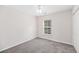 Bright bedroom with a window, plush carpeting, and a spacious closet at 184 Charlesfort Way, Moncks Corner, SC 29461