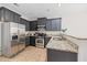 Beautiful kitchen featuring granite countertops, stainless steel appliances, and ample cabinet space at 184 Charlesfort Way, Moncks Corner, SC 29461