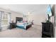 Spacious main bedroom featuring a ceiling fan, TV, and lots of natural light at 184 Charlesfort Way, Moncks Corner, SC 29461