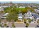 Aerial view of a beautiful neighborhood showcasing well-maintained homes, tree-lined streets, and proximity to the water at 184 Tradd St, Charleston, SC 29401
