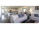Open-concept living area with hardwood floors, stylish furnishings, and a seamless flow to the kitchen and dining at 194 E Pinckney St, Lincolnville, SC 29485