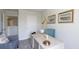 Stylish home office with desk, comfortable chairs, and natural light at 194 E Pinckney St, Lincolnville, SC 29485
