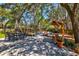 Spacious backyard showcasing a dining area, fire pit area, and grilling station for the ultimate outdoor experience at 2107 Nicholas David Path, Johns Island, SC 29455