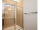 Shower with glass door and tile surround at 2107 Nicholas David Path, Johns Island, SC 29455