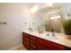 Bathroom with double sink vanity, modern fixtures, and a glass enclosed shower in the background at 2107 Nicholas David Path, Johns Island, SC 29455
