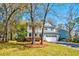 Beautiful two-story home featuring a welcoming front porch, manicured lawn, and a private driveway at 2107 Nicholas David Path, Johns Island, SC 29455