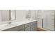 Bathroom featuring double sinks and a glass shower at 2179 Macallan Blvd, Ravenel, SC 29470