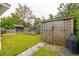 Spacious backyard featuring a shed and patio furniture for outdoor relaxation at 223 Grove St, Charleston, SC 29403