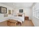 Bright, well decorated bedroom with neutral tones and beach house decor at 223 Grove St, Charleston, SC 29403