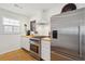 Well-lit kitchen features stainless steel appliances and ample counter space at 223 Grove St, Charleston, SC 29403