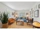 Bright living room featuring neutral walls, a large window, and stylish furniture at 223 Grove St, Charleston, SC 29403