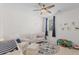 Bright and airy Bedroom featuring a crib, chair, and playful decor at 233 Ashmont Dr, Wando, SC 29492