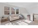 Cozy bonus room featuring three large windows for tons of natural light at 233 Ashmont Dr, Wando, SC 29492