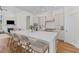 Open-concept kitchen boasts a large island with seating, modern appliances, and stylish countertops at 233 Ashmont Dr, Wando, SC 29492