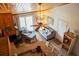 Overhead view of the living area featuring a fireplace, wood ceiling, and a sliding door at 259 Sea Cloud Cir, Edisto Island, SC 29438