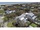 Expansive aerial view showcasing the house with its stylish design, landscaping, and neighborhood near the beach at 2607 Cameron Blvd, Isle of Palms, SC 29451