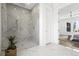 Modern bathroom featuring a glass-enclosed shower with marble tiles and luxury finishes throughout at 2607 Cameron Blvd, Isle of Palms, SC 29451