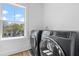 Laundry room features new front load washer and dryer, and a window at 2607 Cameron Blvd, Isle of Palms, SC 29451